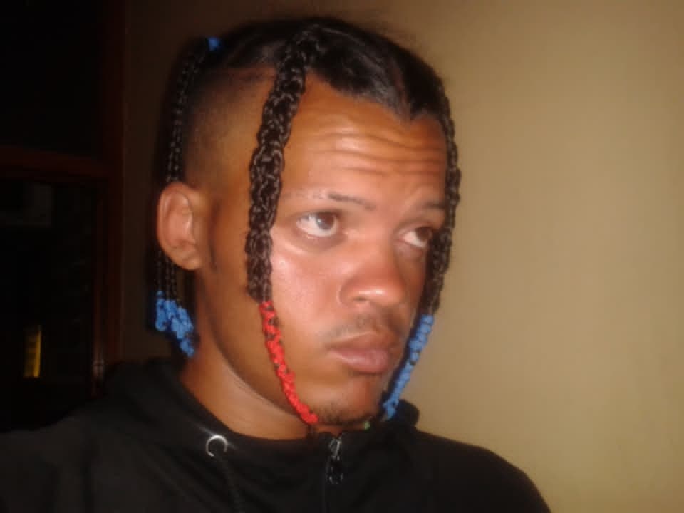 Epic.G portrait with braids